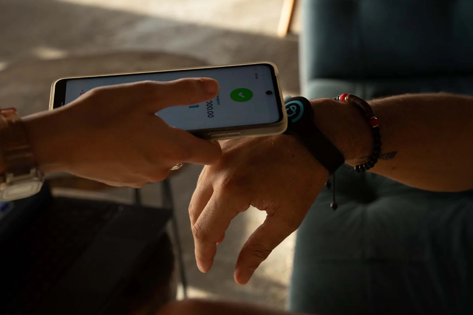 Social Creative POS system Cashless payments phone tapping wristband